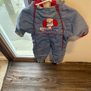 It is a baby boy all in one coat